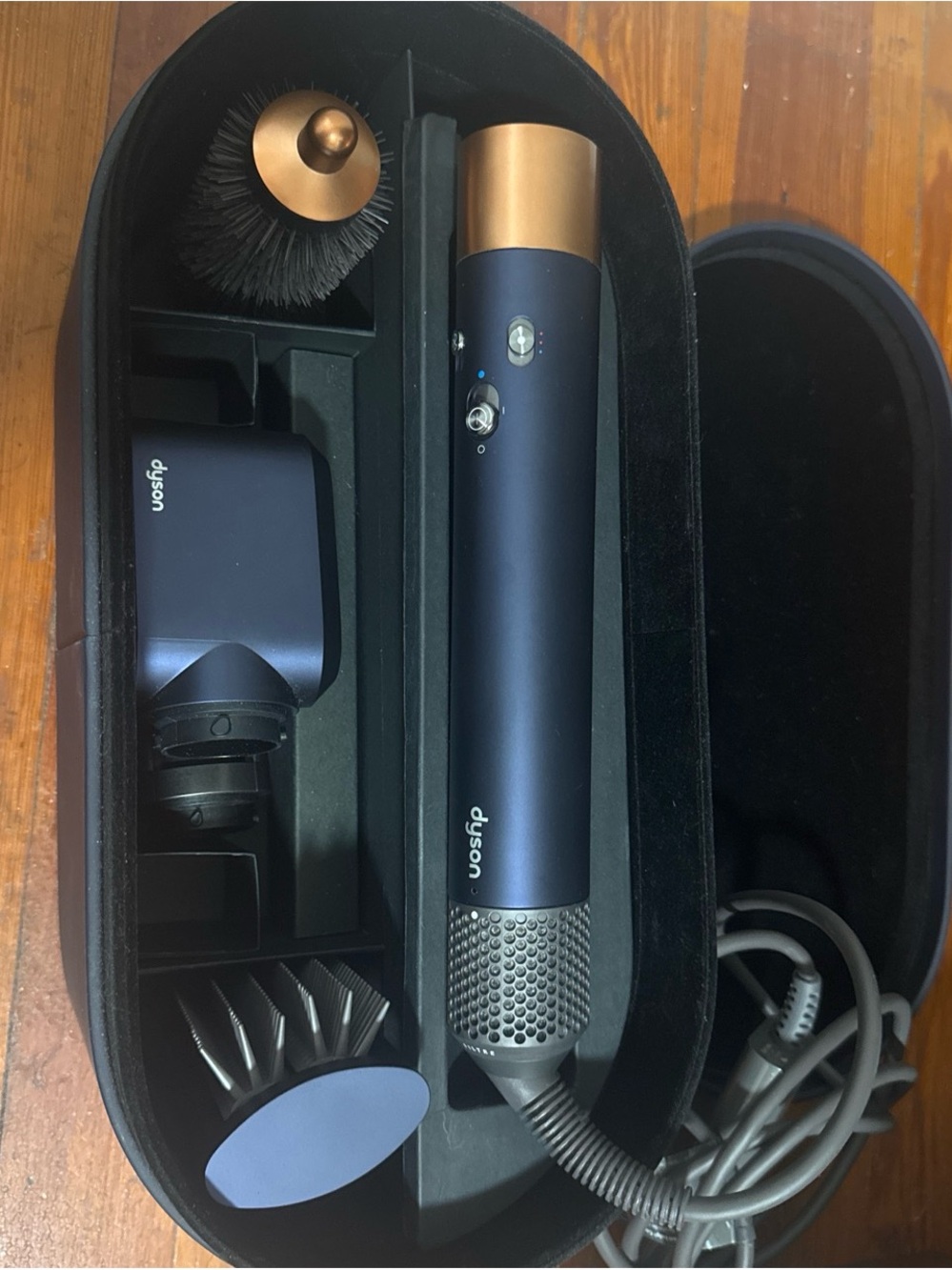 Dyson navy and gold hair styling wand with attachments